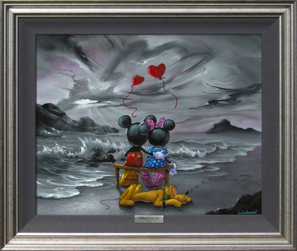 A black and white rocky beach scene is pictured, with various shades of grey clouds, light, mountains, and waves. In the middle of the grey is a colorful Mickey and Minnie sitting on a bench, Pluto sleeping behind the couple. Above them flies two red heart-shaped balloons.