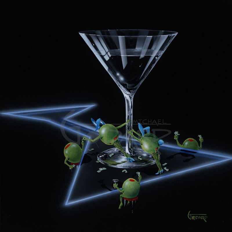 Black background pub table depicting two female green olives doing a "dirty dance" on the stem of a martini glass. They are wearing blue bunny ears and tail with blue high heels, while three male green olives are sitting around the table watching the "dancers". A blue "neon" martini glass lights up the dance floor.